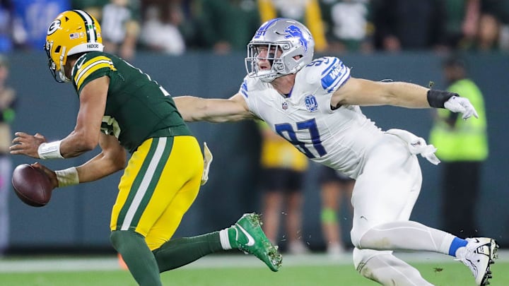 Detroit Lions defensive end Aidan Hutchinson (97) chases down Green Bay Packers quarterback Jordan Love (10) for a sack during their football game on Thursday, September 28, 2023, at Lambeau Field in Green Bay, Wis. The Lions won the game, 34-20.
Tork Mason/USA TODAY NETWORK-Wisconsin