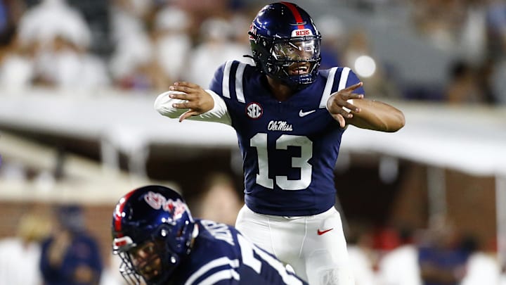 Aug 31, 2024; Oxford, Mississippi, USA; Mississippi Rebels quarterback Austin Simmons (13) gives direction prior to the snap against the Furman Paladins during the second half at Vaught-Hemingway Stadium. Mandatory Credit: Petre Thomas-Imagn Images