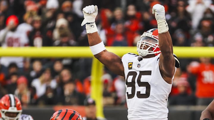 Jan 4, 2026; Cincinnati, Ohio, USA; Cleveland Browns defensive end Myles Garrett (95) celebrates following a sack against the Cincinnati Bengals during the fourth quarter at Paycor Stadium. The play set a new NFL single season sack record by Garrett. Mandatory Credit: Joseph Maiorana-Imagn Images