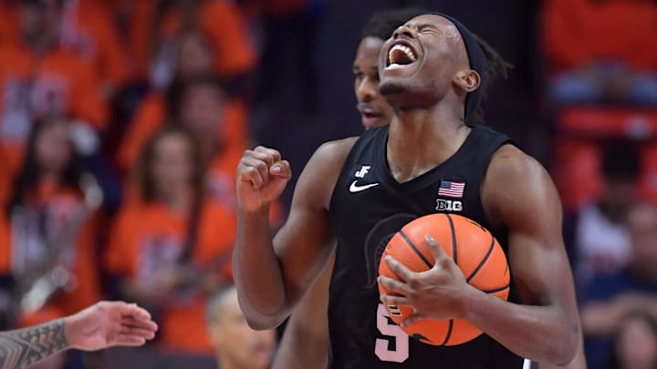 Feb 15, 2025; Champaign, Illinois, USA;  Michigan State Spartans guard Tre Holloman (5) reacts after a win over the Illinois Fighting Illini at State Farm Center. Mandatory Credit: Ron Johnson-Imagn Images