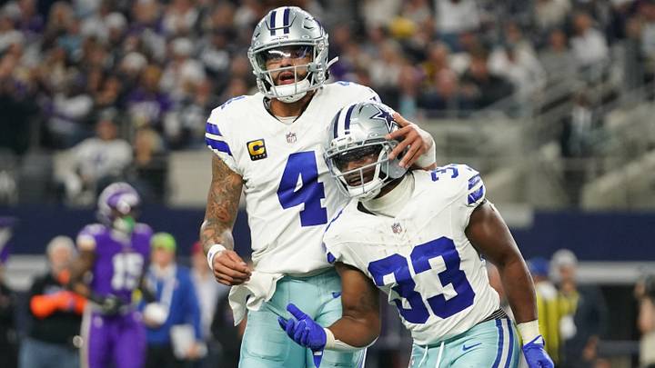 Dallas Cowboys running back Javonte Williams (33) celebrates with quarterback Dak Prescott (4) after a touchdown during the first half against the Minnesota Vikings at AT&T Stadium. Mandatory Credit: Raymond Carlin III-Imagn Images