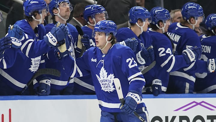 Mar 3, 2025; Toronto, Ontario, CAN; Toronto Maple Leafs forward Matthew Knies (23) gets congratulated after a goal against the San Jose Sharks during the second period at Scotiabank Arena. Mandatory Credit: John E. Sokolowski-Imagn Images