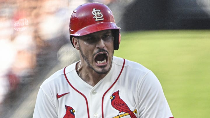 Aug 6, 2022; St. Louis, Missouri, USA;  St. Louis Cardinals third baseman Nolan Arenado (28) reacts after hitting a one run single against the New York Yankees during the first inning at Busch Stadium. Mandatory Credit: Jeff Curry-Imagn Images