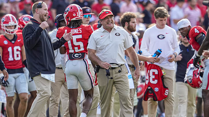 Aug 30, 2025; Athens, Georgia, USA; Georgia Bulldogs head coach Kirby Smart (center) reacts during the game against the Marshall Thundering Herd at Sanford Stadium. Mandatory Credit: Dale Zanine-Imagn Images