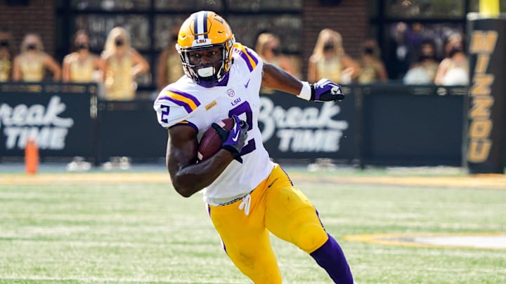 Oct 10, 2020; Columbia, Missouri, USA;  LSU Tigers tight end Arik Gilbert (2) runs against the Missouri Tigers during the first half at Faurot Field at Memorial Stadium. Mandatory Credit: Jay Biggerstaff-Imagn Images