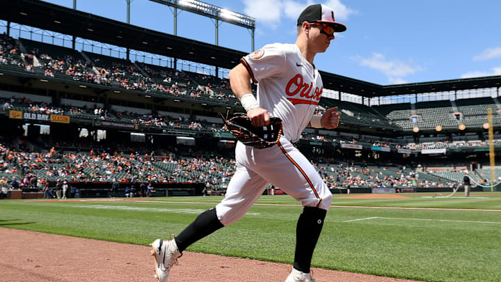 Apr 13, 2025; Baltimore, Maryland, USA; Baltimore Orioles outfielder Tyler O'Neill (9) runs on to the field before a game against the Toronto Blue Jays at Oriole Park at Camden Yards. Apr 13, 2025; Baltimore, Maryland, USA; Baltimore Orioles outfielder Tyler O'Neill (9) runs on to the field before a game against the Toronto Blue Jays at Oriole Park at Camden Yards.