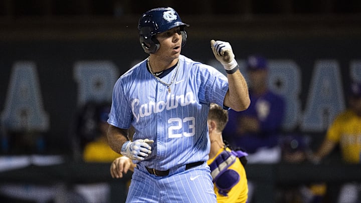Jun 2, 2024; Chapel Hill, NC, USA; North Carolina Tar Heels designated hitter Alberto Osuna (23) reacts to earning a walk against the Louisiana State Tigers  in the ninth inning of the Div. I NCAA baseball regional at Boshamer Stadium.  Mandatory Credit: Jeffrey Camarati-Imagn Images
