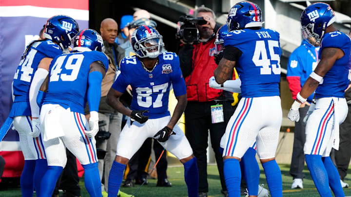 New York Giants wide receiver Ihmir Smith-Marsette (87) celebrates with his teammates in the end zone when they thought he had just scored a touchdown. However, the ball was called back due to a penalty.