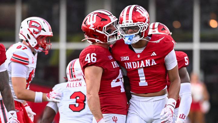 Sep 19, 2026; Bloomington, Indiana, USA; Indiana Hoosiers linebacker Isaiah Jones (46) and Indiana Hoosiers defensive back Amare Ferrell (1) celebrate after a play against the Western Kentucky Hilltoppers during the second half at Merchants Bank Field at Memorial Stadium. Mandatory Credit: Robert Goddin-Imagn Images