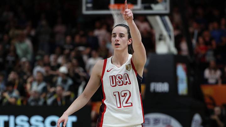 Caitlin Clark points during a FIBA World Cup game.