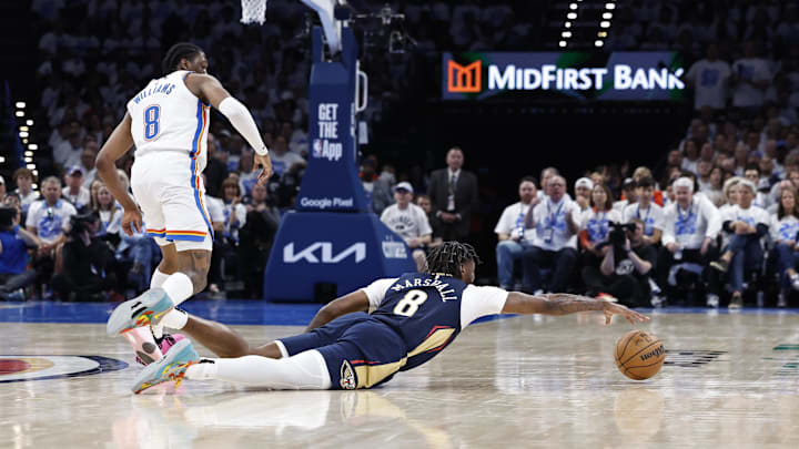 Apr 21, 2024; Oklahoma City, Oklahoma, USA; New Orleans Pelicans forward Naji Marshall (8) reaches