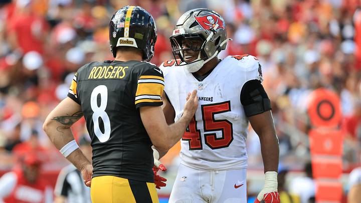 Oct 18, 2026; Tampa, Florida, USA;  Pittsburgh Steelers quarterback Aaron Rodgers (8) speaks with Tampa Bay Buccaneers linebacker Josiah Trotter (45) during the third quarter at Raymond James Stadium.  Mandatory Credit: Kim Klement Neitzel-Imagn Images