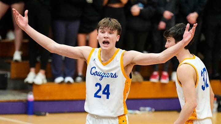 Greenfield-Central Cougars guard Braylon Mullins (24) yells to teammates on Saturday, March 8, 2025, during the IHSAA boys basketball sectional final at Muncie Fieldhouse in Muncie. Mt. Vernon Marauders defeated the Greenfield-Central Cougars in double overtime, 76-73.