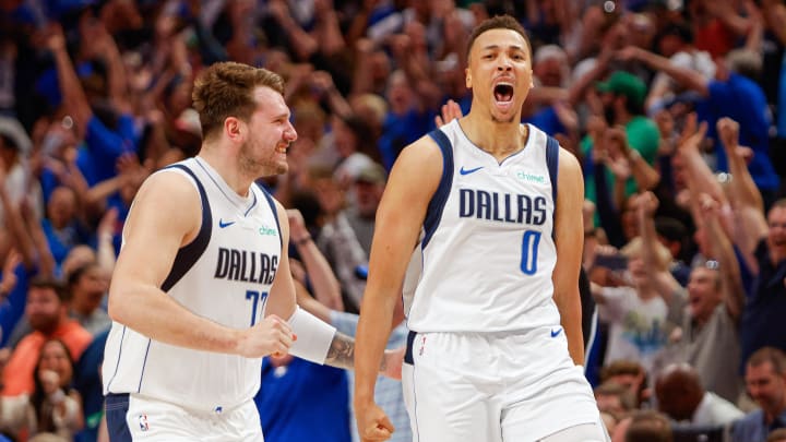 Apr 7, 2024; Dallas, Texas, USA; Dallas Mavericks guard Luka Doncic (77) celebrates with guard Dante