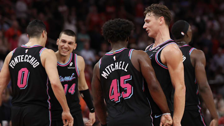 Mar 21, 2026; Houston, Texas, USA;  Miami Heat guard Pelle Larsson (9) and teammates celebrate play against the Houston Rockets in the second half at Toyota Center. Mandatory Credit: Thomas Shea-Imagn Images