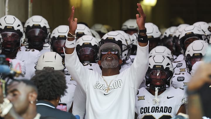 Sep 12, 2025; Houston, Texas, USA; Colorado Buffaloes head coach Deion Sanders prepares to lead the team out of the tunnel before the game against the Houston Cougars at TDECU Stadium. Mandatory Credit: Troy Taormina-Imagn Images