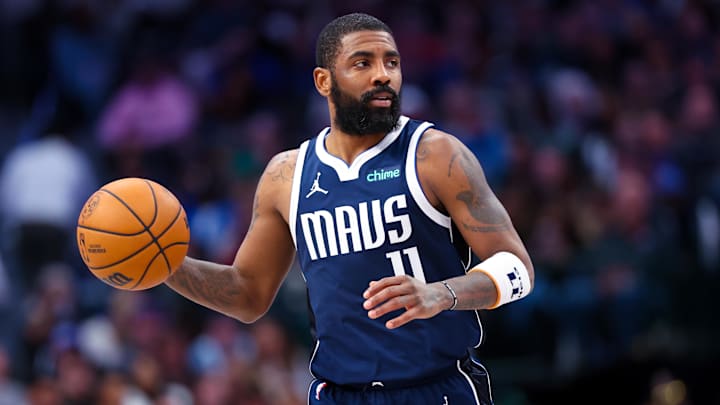 Feb 10, 2024; Dallas, Texas, USA; Dallas Mavericks guard Kyrie Irving (11) dribbles during the