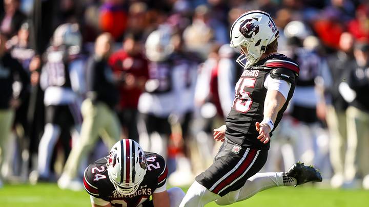 Nov 29, 2025; Columbia, South Carolina, USA; South Carolina Gamecocks kicker William Joyce (45) kicks an extra point against the Clemson Tigers in the second quarter at Williams-Brice Stadium. Mandatory Credit: Jeff Blake-Imagn Images