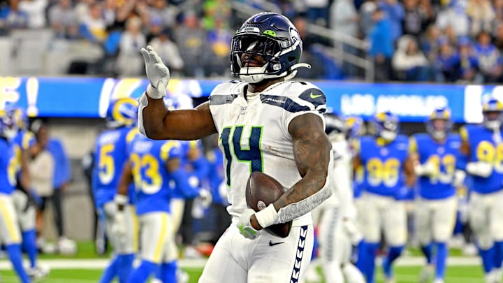 Dec 4, 2022; Inglewood, California, USA; Seattle Seahawks wide receiver DK Metcalf (14) celebrates after a touchdown in the fourth quarter against the Los Angeles Rams at SoFi Stadium. Mandatory Credit: Jayne Kamin-Oncea-Imagn Images