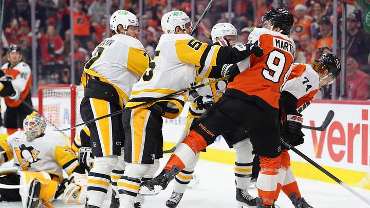 Apr 29, 2026; Philadelphia, Pennsylvania, USA; Pittsburgh Penguins center Noel Acciari (55) hits Philadelphia Flyers right wing Porter Martone (94) in the first period in game six of the first round of the 2026 Stanley Cup Playoffs at Xfinity Mobile Arena.