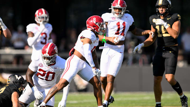 Oct 5, 2024; Nashville, Tennessee, USA;  Alabama Crimson Tide defensive back DeVonta Smith (8) celebrates a tackle against the Vanderbilt Commodores during the first half at FirstBank Stadium. Mandatory Credit: Steve Roberts-Imagn Images