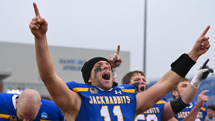 South Dakota State quarterback Mark Gronowski (11) cheers after singing the victory song on Saturday, Dec. 14, 2024, at Dana J. Dykhouse Stadium in Brookings. South Dakota State quarterback Mark Gronowski (11) cheers after singing the victory song on Saturday, Dec. 14, 2024, at Dana J. Dykhouse Stadium in Brookings.