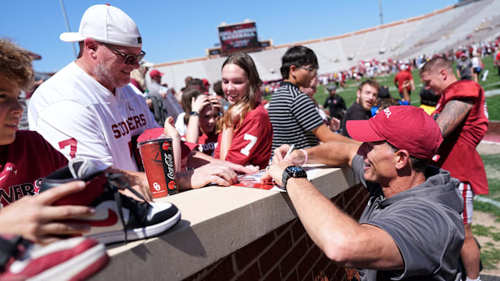 Oklahoma head football coach Brent Venables signs autographs during the University of Oklahoma Sooners Crimson Combine at Gaylord Family - Oklahoma Memorial Stadium in Norman, Okla., Saturday, April, 12, 2025.