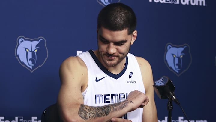 Sep 29, 2025; Memphis, TN, USA; Memphis Grizzlies center Zach Edey speaks to media during a press conference on media day at FedEx Forum. Mandatory Credit: Petre Thomas-Imagn Images Mandatory Credit: Petre Thomas-Imagn Images Sep 29, 2025; Memphis, TN, USA; Memphis Grizzlies center Zach Edey speaks to media during a press conference on media day at FedEx Forum. Mandatory Credit: Petre Thomas-Imagn Images Mandatory Credit: Petre Thomas-Imagn Images