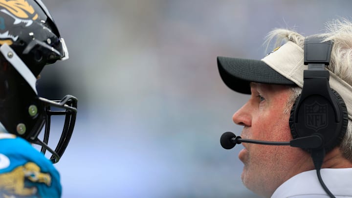 Jacksonville Jaguars head coach Doug Pederson talks with guard Brandon Scherff (68) during the second quarter of an NFL football matchup Sunday, Oct. 6, 2024 at EverBank Stadium in Jacksonville, Fla. The Jaguars edged the Colts on a field goal 37-34. [Corey Perrine/Florida Times-Union]