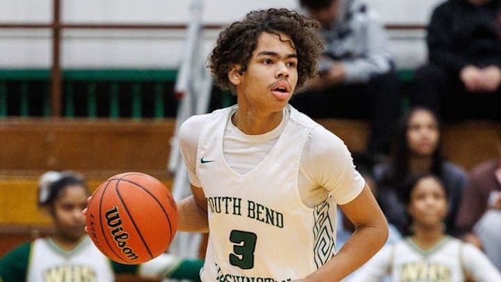 Washington's Steven Reynolds (3) advances the ball up court during the Mishawaka Marian-South Bend Washington game Washington's Steven Reynolds (3) advances the ball up court during the Mishawaka Marian-South Bend Washington game