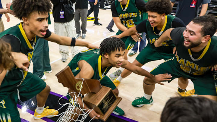 Damien boys basketball team celebrates its CIF State Division I championship at the Golden 1 Center in Sacramento on Friday, March 13, 2026. Damien boys basketball team celebrates its CIF State Division I championship at the Golden 1 Center in Sacramento on Friday, March 13, 2026.