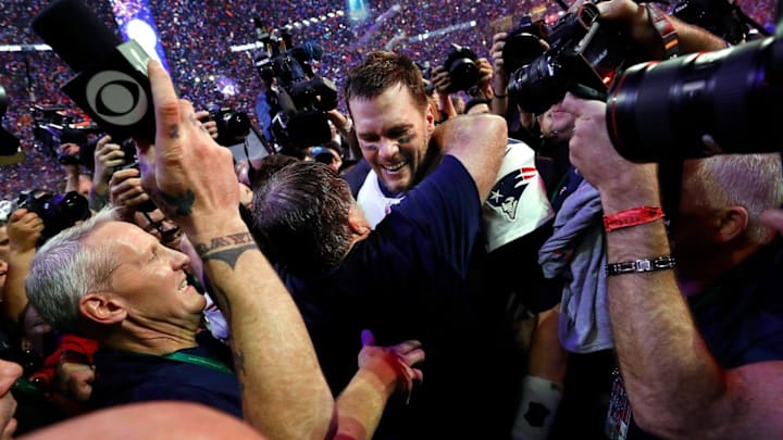 Tom Brady celebrates with coach Bill Belichick after winning 13-3 over the Los Angeles Rams in Super Bowl LIII at the Mercedes-Benz Stadium in Atlanta.