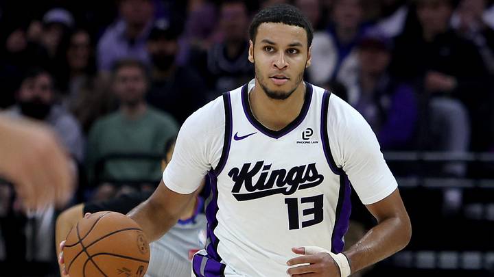 Jan 1, 2026; Sacramento, California, USA; Sacramento Kings forward Keegan Murray (13) dribbles the ball up court against the Boston Celtics during the third quarter at Golden 1 Center. Mandatory Credit: Dennis Lee-Imagn Images