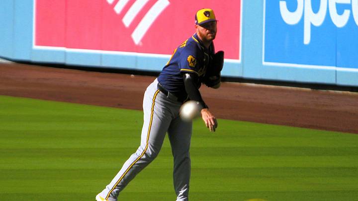 Milwaukee Brewers pitcher Brandon Woodruff throws in the outfield during a team workout prior to Game 3 of the NLCS at Dodger Stadium on Oct. 13, 2026. Milwaukee Brewers pitcher Brandon Woodruff throws in the outfield during a team workout prior to Game 3 of the NLCS at Dodger Stadium on Oct. 13, 2026.