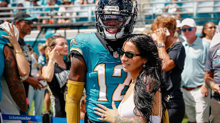 Jacksonville Jaguars player Travis Hunter (12) with his wife during pregame against the Houston Texans at EverBank Stadium. Jacksonville Jaguars player Travis Hunter (12) with his wife during pregame against the Houston Texans at EverBank Stadium.