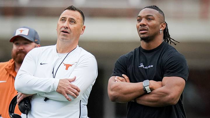 Texas Longhorns Head Coach Steve Sarkisian and former Longhorn Bijan Robinson watch the Longhorns' spring Orange and White game at Darrell K Royal Texas Memorial Stadium. Texas Longhorns Head Coach Steve Sarkisian and former Longhorn Bijan Robinson watch the Longhorns' spring Orange and White game at Darrell K Royal Texas Memorial Stadium.