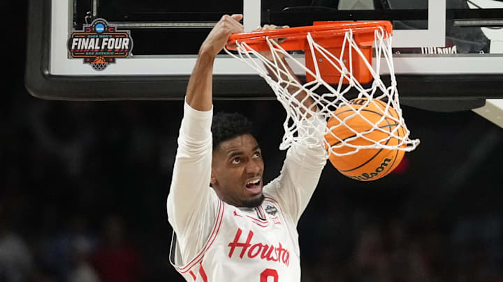 Apr 7, 2025; San Antonio, TX, USA; Houston Cougars guard Mylik Wilson (8) dunks against the Florida Gators in the first half in the national championship game of the Final Four of the 2025 NCAA Tournament at the Alamodome. Apr 7, 2025; San Antonio, TX, USA; Houston Cougars guard Mylik Wilson (8) dunks against the Florida Gators in the first half in the national championship game of the Final Four of the 2025 NCAA Tournament at the Alamodome.