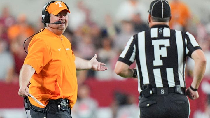 Tennessee coach Josh Heupel talks with an official during a college football game at Bryant-Denny Stadium in Tuscaloosa, Ala., on Oct. 18, 2025.