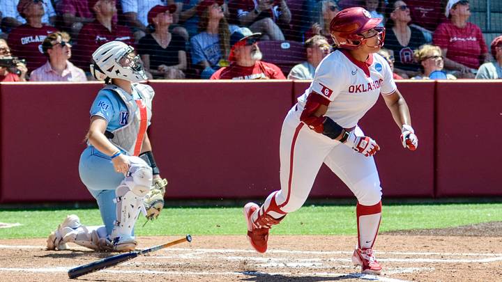 Oklahoma outfielder Ella Parker runs after hitting a ball against Kansas. Parker led off the Sooners' intrasquad Battle Series matchup Wednesday with a home run. Oklahoma outfielder Ella Parker runs after hitting a ball against Kansas. Parker led off the Sooners' intrasquad Battle Series matchup Wednesday with a home run.