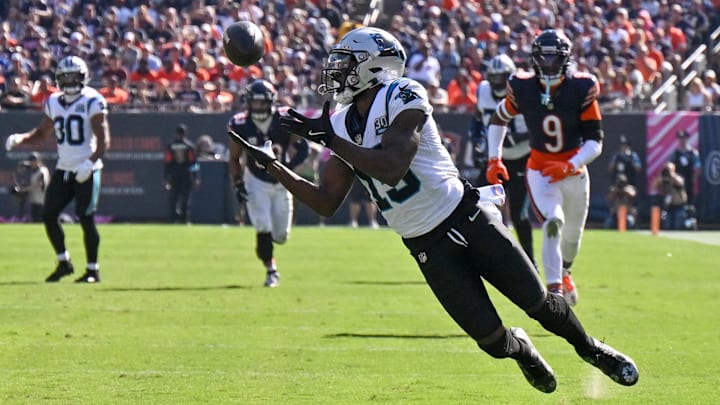 Oct 6, 2024; Chicago, Illinois, USA; Carolina Panthers wide receiver Jonathan Mingo (15) makes a diving catch against the Chicago Bears during the third quarter at Soldier Field. Mandatory Credit: Daniel Bartel-Imagn Images Oct 6, 2024; Chicago, Illinois, USA; Carolina Panthers wide receiver Jonathan Mingo (15) makes a diving catch against the Chicago Bears during the third quarter at Soldier Field. Mandatory Credit: Daniel Bartel-Imagn Images