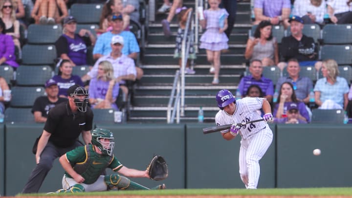 Karson Bowen (14), attempting to lay down a bunt against Baylor on 04/25/2025