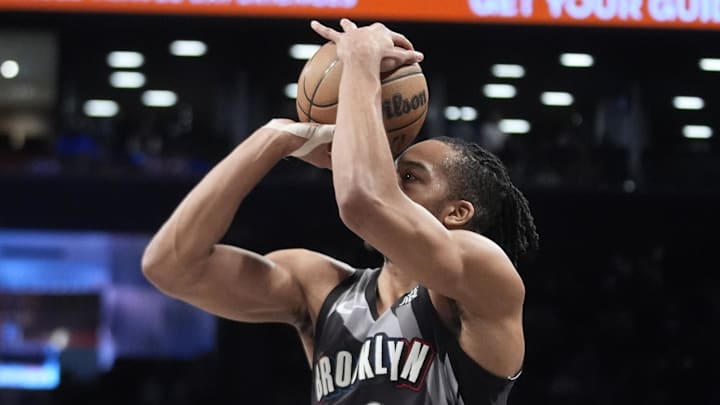 Apr 6, 2025; Brooklyn, New York, USA; Brooklyn Nets forward Tosan Evbuomwan (12) shoots a three point jump shot against the Toronto Raptors during the second half at Barclays Center. Mandatory Credit: Gregory Fisher-Imagn Images Apr 6, 2025; Brooklyn, New York, USA; Brooklyn Nets forward Tosan Evbuomwan (12) shoots a three point jump shot against the Toronto Raptors during the second half at Barclays Center. Mandatory Credit: Gregory Fisher-Imagn Images