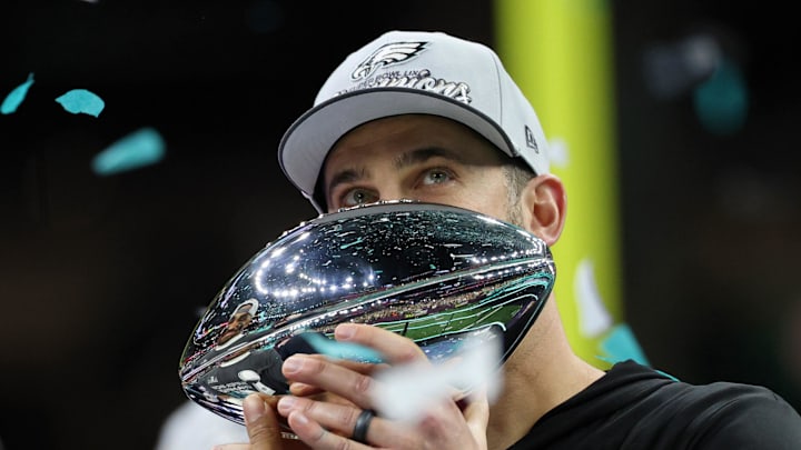 Feb 9, 2025; New Orleans, LA, USA; Philadelphia Eagles head coach Nick Sirianni kisses the Vince Lombardi Trophy after winning against Kansas City Chiefs in Super Bowl LIX at Caesars Superdome. Mandatory Credit: Geoff Burke-Imagn Images Feb 9, 2025; New Orleans, LA, USA; Philadelphia Eagles head coach Nick Sirianni kisses the Vince Lombardi Trophy after winning against Kansas City Chiefs in Super Bowl LIX at Caesars Superdome. Mandatory Credit: Geoff Burke-Imagn Images
