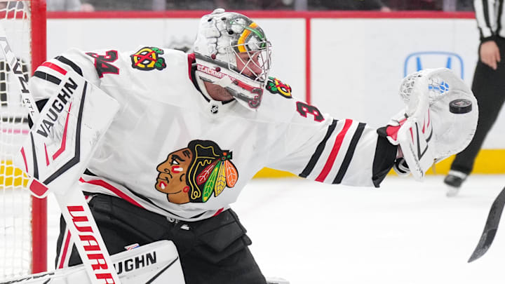 Feb 1, 2025; Sunrise, Florida, USA; Chicago Blackhawks goaltender Petr Mrazek (34) makes a save against the Florida Panthers in the second period at Amerant Bank Arena. Mandatory Credit: Jim Rassol-Imagn Images Feb 1, 2025; Sunrise, Florida, USA; Chicago Blackhawks goaltender Petr Mrazek (34) makes a save against the Florida Panthers in the second period at Amerant Bank Arena. Mandatory Credit: Jim Rassol-Imagn Images