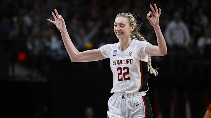 Mar 29, 2024; Portland, OR, USA; Stanford Cardinal forward Cameron Brink (22) celebrates after scoring a three point shot during the first half against NC State Wolfpack in the semifinals of the Portland Regional of the 2024 NCAA Tournament at the Moda Center at the Moda Center. Mandatory Credit: Troy Wayrynen-Imagn Images Mar 29, 2024; Portland, OR, USA; Stanford Cardinal forward Cameron Brink (22) celebrates after scoring a three point shot during the first half against NC State Wolfpack in the semifinals of the Portland Regional of the 2024 NCAA Tournament at the Moda Center at the Moda Center. Mandatory Credit: Troy Wayrynen-Imagn Images