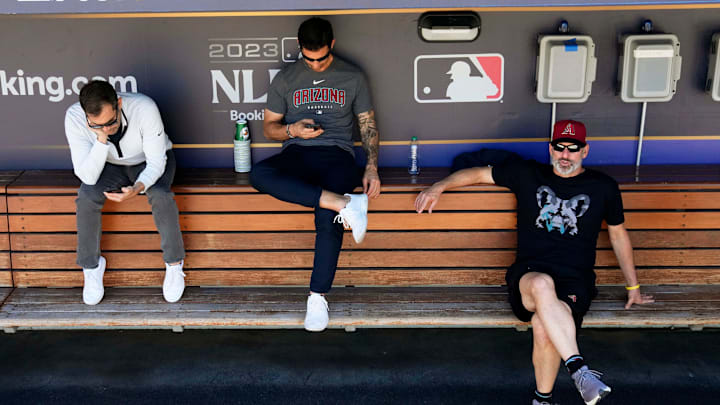 Assistant general manager Amiel Sawdaye, general manager Mike Hazen, and manager Torey Lovullo during batting practice at Dodger Stadium in Los Angeles on Oct. 8, 2023. Assistant general manager Amiel Sawdaye, general manager Mike Hazen, and manager Torey Lovullo during batting practice at Dodger Stadium in Los Angeles on Oct. 8, 2023.