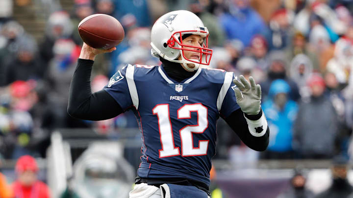 Dec 31, 2017; Foxborough, MA, USA; New England Patriots quarterback Tom Brady (12) throws during the first quarter against the New York Jets at Gillette Stadium. Mandatory Credit: Winslow Townson-Imagn Images