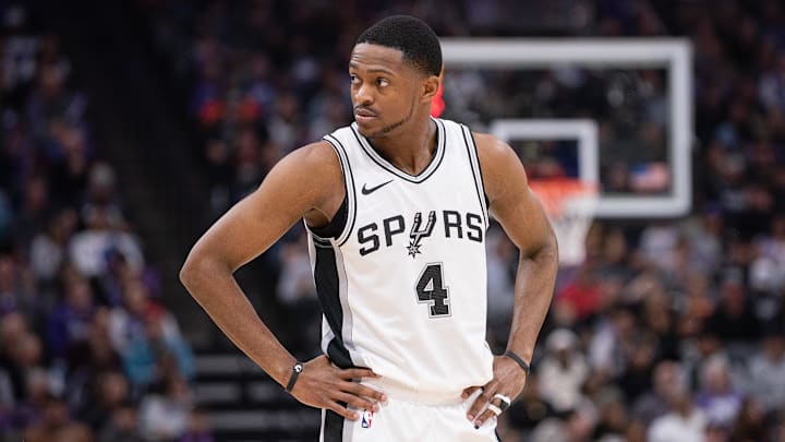 Mar 7, 2025; Sacramento, California, USA; San Antonio Spurs guard De'Aaron Fox (4) looks on during the first quarter of the game against the Sacramento Kings at Golden 1 Center.