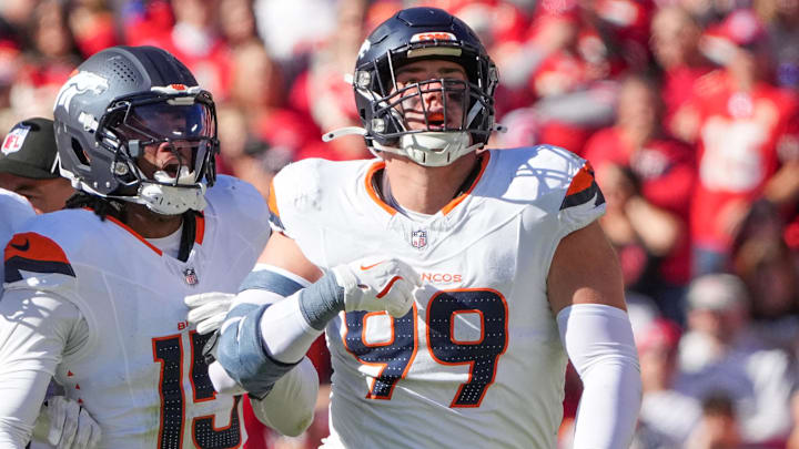 Nov 10, 2024; Kansas City, Missouri, USA; Denver Broncos defensive end Zach Allen (99) celebrates after a play against the Kansas City Chiefs during the game at GEHA Field at Arrowhead Stadium. Nov 10, 2024; Kansas City, Missouri, USA; Denver Broncos defensive end Zach Allen (99) celebrates after a play against the Kansas City Chiefs during the game at GEHA Field at Arrowhead Stadium.