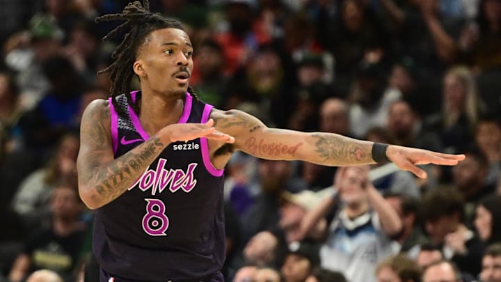 Jan 13, 2026; Milwaukee, Wisconsin, USA; Minnesota Timberwolves guard Bones Hyland (8) reacts after scoring a 3-point basket in the third quarter against the Milwaukee Bucks at Fiserv Forum.